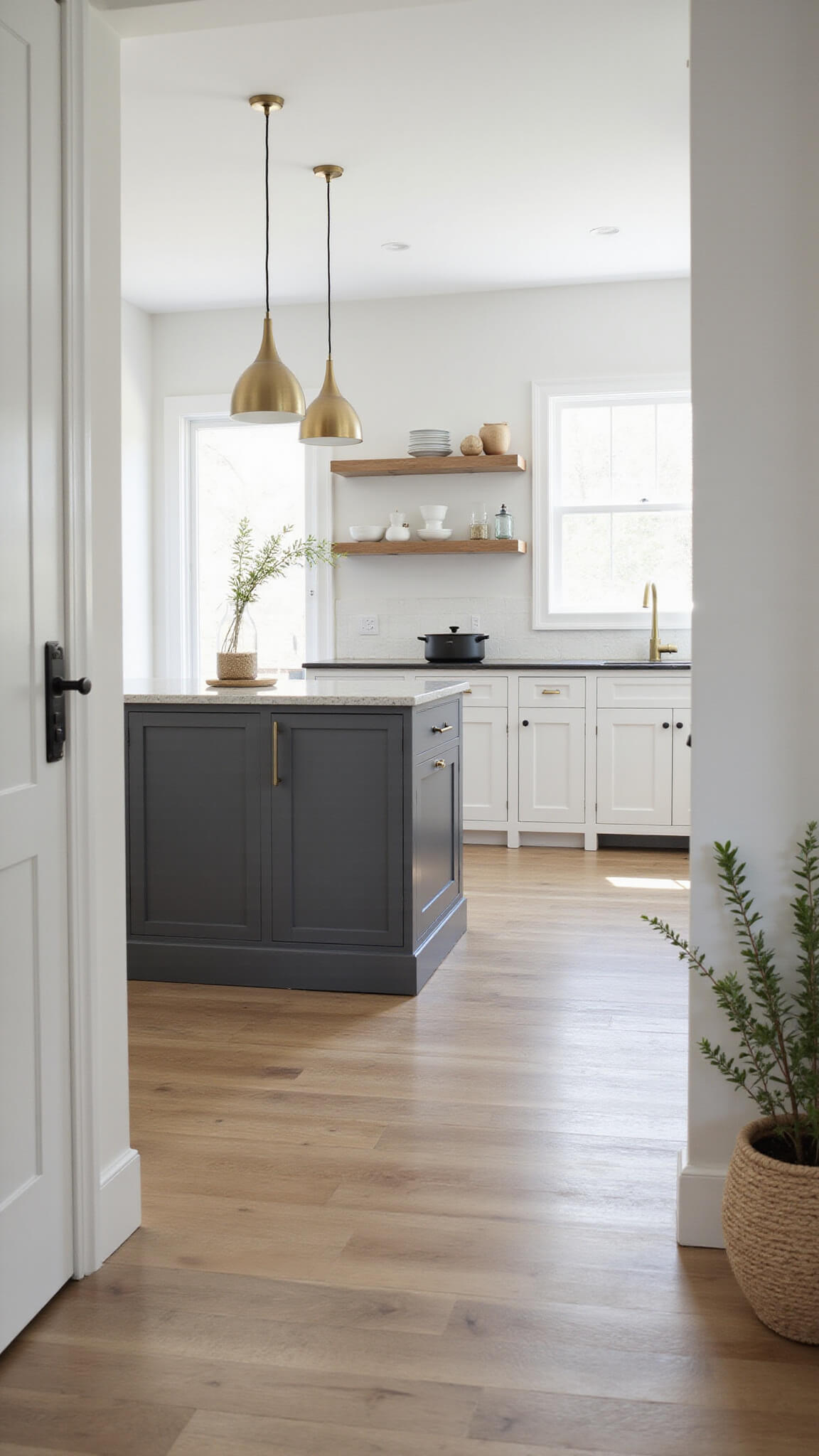 Bright modern 15x20ft kitchen with white SEKTION cabinets, charcoal island, floor-to-ceiling windows, and natural oak flooring.