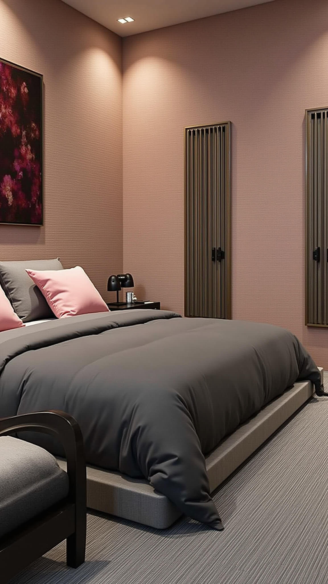 Contemporary 15x15ft primary bedroom with dusty pink grasscloth wallpaper, charcoal California king bed, pink pillows, abstract burgundy art, and moody recessed lighting.